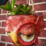Red Hanging Pothead Planter
$60